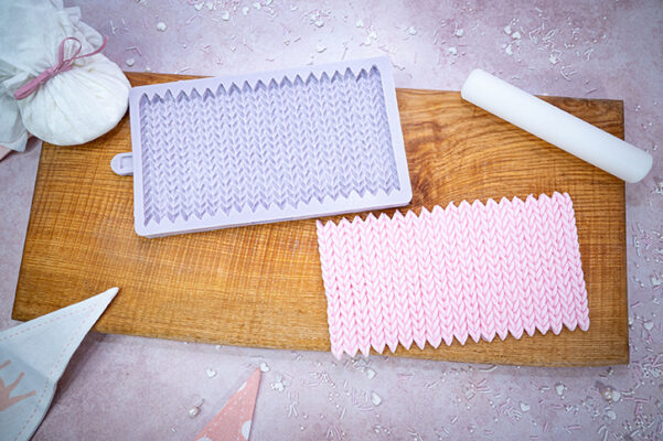 Introducing our Christmas Tree Characters Silicone Mould – a delightful and whimsical tool designed to bring festive charm to your baking and crafting during the holiday season. Crafted from high-quality food-grade silicone, this mould features adorable Christmas tree character shapes, allowing you to effortlessly create playful and festive treats. Giving you four cute, novelty Christmas trees – Santa, reindeer, snowman and tree as well as eleven accessories for your cakes and bakes. Bow, stars, trees, light, bauble, stocking, holly and snowflakes. Visit our Recipes page for our no spread cookie recipes! 🍪 Premium Quality Silicone: Crafted from food-grade silicone, our mould is safe for use with various materials, including fondant, chocolate, gum paste, and more. The silicone’s flexibility and non-stick surface ensure easy release, allowing you to achieve intricate details with precision. 🎨Versatility:Whether you’re a skilled baker, a DIY enthusiast, or just looking to add a playful element to your festive celebrations, this silicone mould is perfect for creating a variety of Christmas-themed goodies. Use it for baking, making chocolates, crafting decorative elements, or creating unique ornaments. 🍰 Festive Tree Characters: The mould showcases a variety of charming Christmas tree character designs, each brimming with holiday cheer. From a smiling Christmas tree to a Santa tree, these playful shapes add a touch of whimsy to your creations. 🧼 Easy to Clean: The non-stick surface makes demolding a breeze, and the flexibility of the silicone allows for easy removal without compromising the fine details. Cleaning is simple – wash the mould with mild soap and warm water, or place it in the dishwasher for added convenience. 🎁 DIY Decor Projects: Create a Christmas tree character wonderland by incorporating these shapes into your DIY holiday decor. Craft edible ornaments or use them to adorn your festive table setting. All of our original design moulds are made by hand in the UK and independently tested to assure compliance to the highest food standards. Our moulds can be used with Sugarpaste, Rolled Buttercream, Flower paste, Marzipan, Modelling paste, Chocolate, Candy, Boiled Sugar, Saltdough, Air Drying Clays, Cold Porcelain and Embossing Powder.